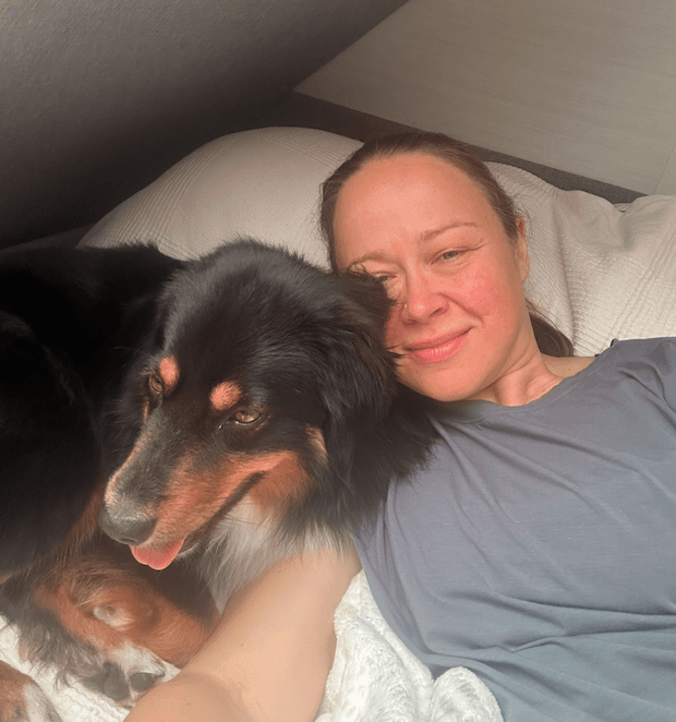 Tania, co-founder of Happy Dog League, with her dog